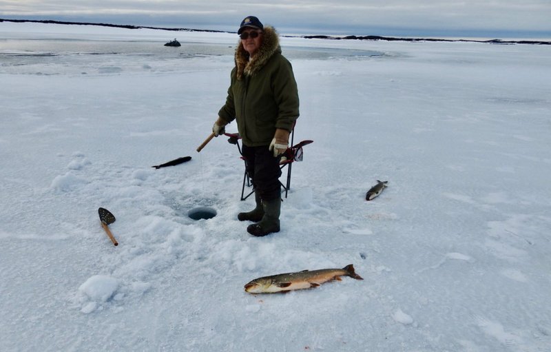 Image: Ice Fishing Adventure Heats Up in Canadian Winter Wonderland